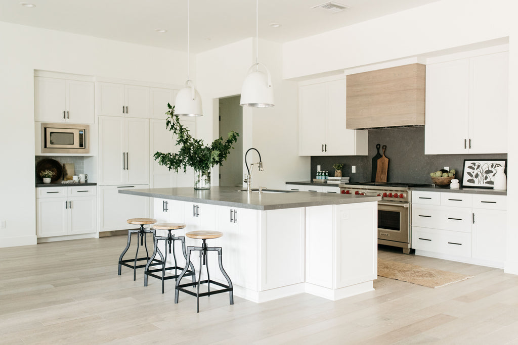 greige design shop + interiors albion project san diego california white kitchen black counters