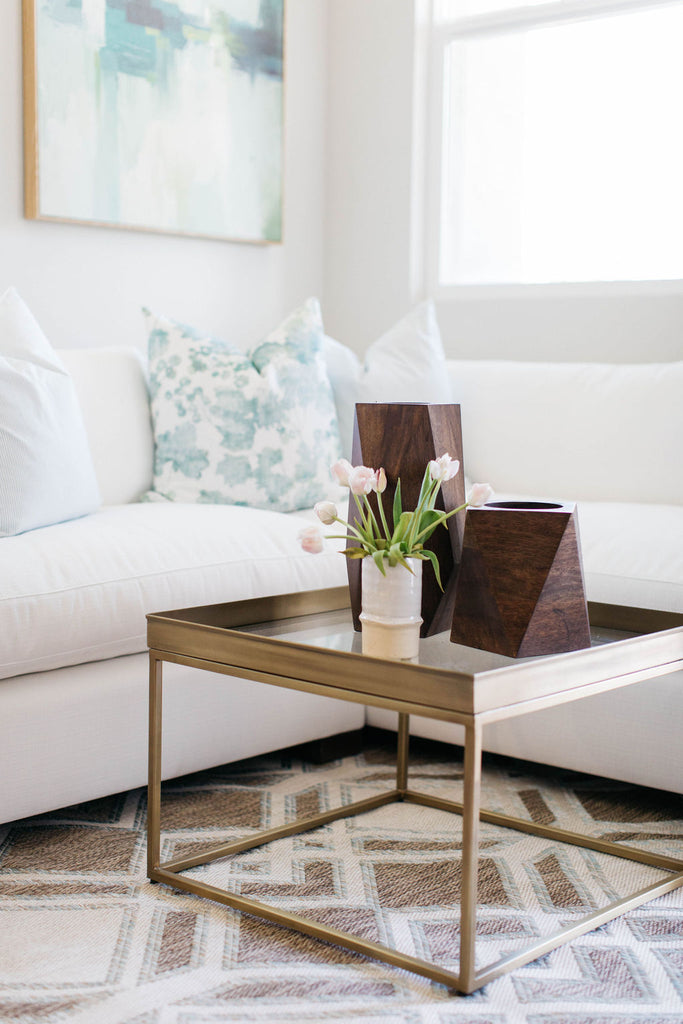 greige design shop + interiors  white sofa california style Orange County brass bunching tables 