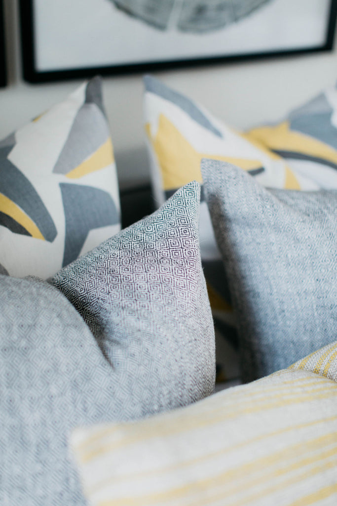 greige design shop + interiors greyg and yellow bedroom pillows kravet fabrics greige textiles texture Nick fabric
