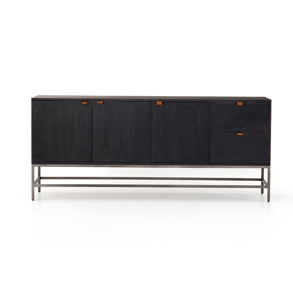 Inspired by sleek mid-century design, a stylish sideboard of black-washed poplar offers ample storage space by way of interior cabinetry and spacious dual drawers. Metal-secured pulls of toffee top-grain leather add a textural element of surprise.