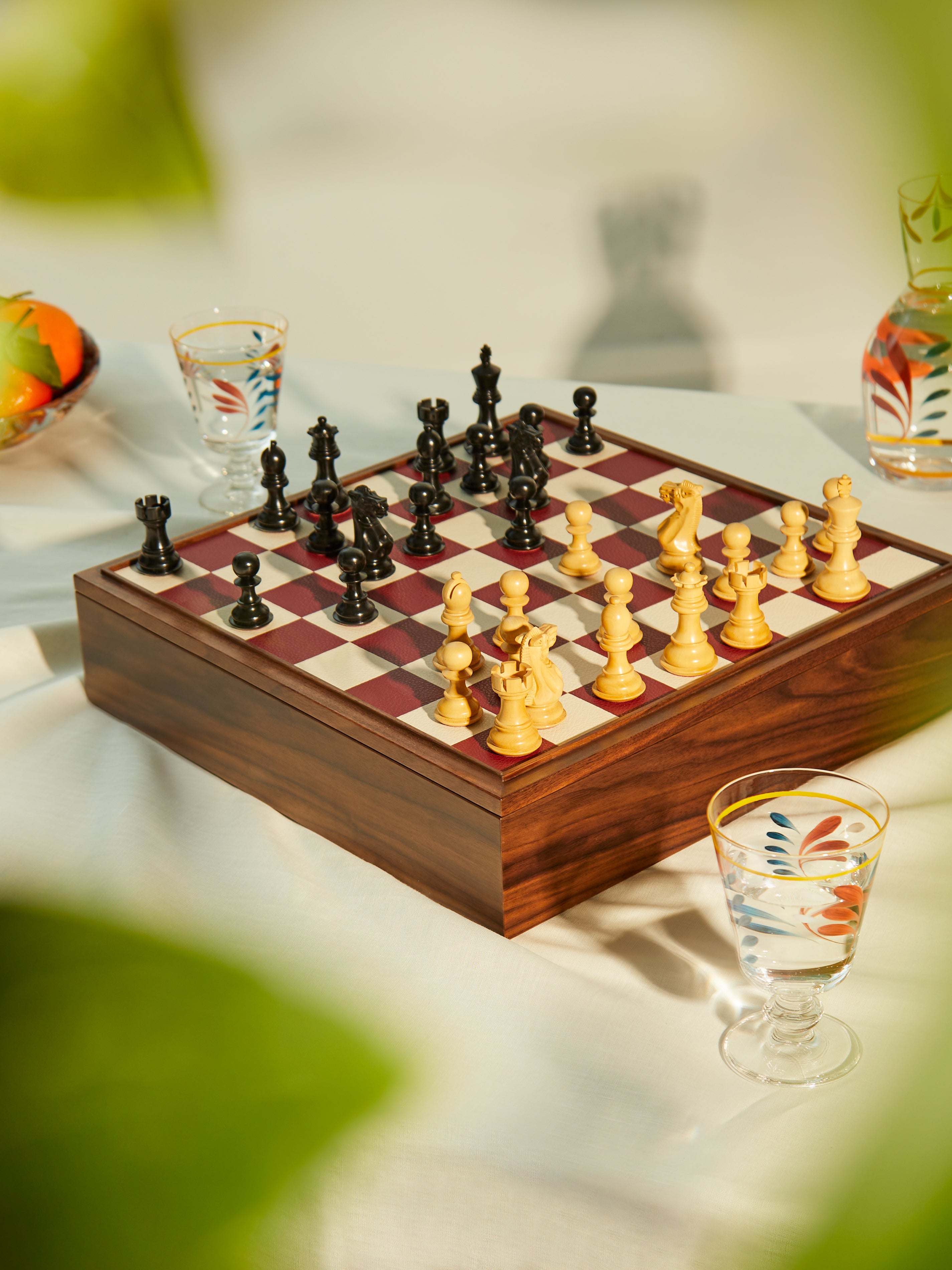 glass chess set with wooden case