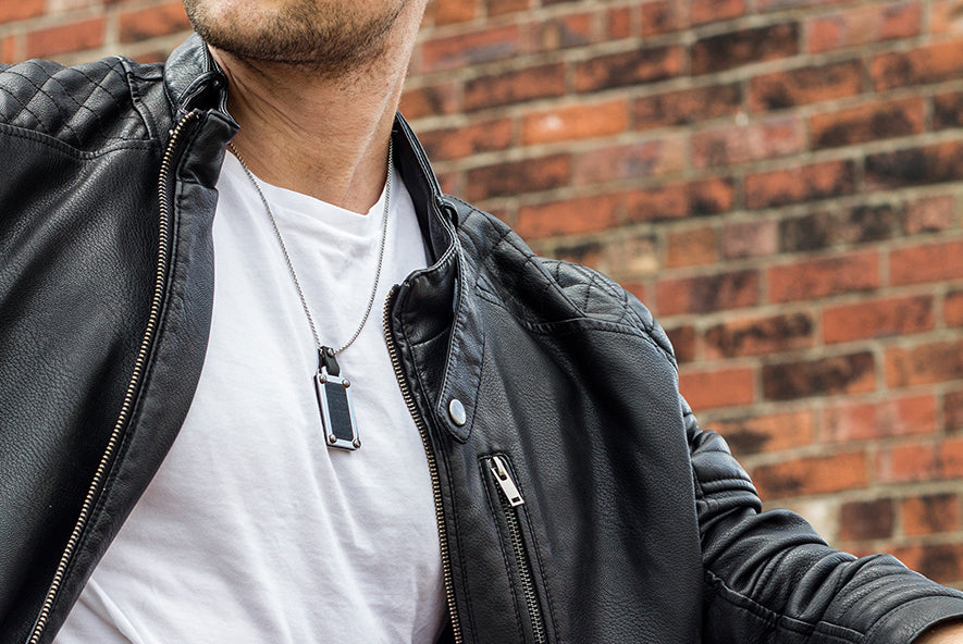 Vanacci black forge fragrance pendant on a man in leather jacket  