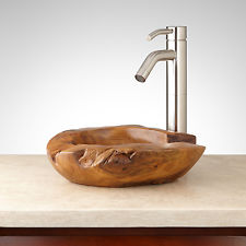 rustic teak bowl paired with mod faucet