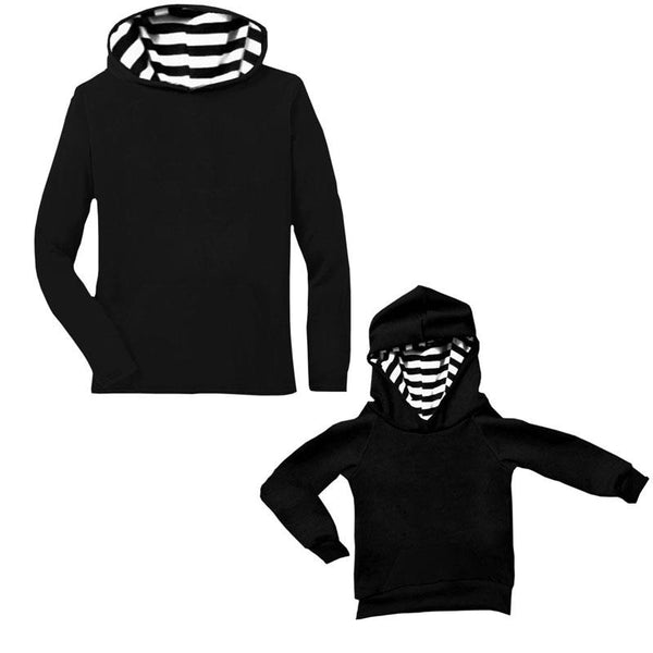 white hoodie with black stripes on sleeves