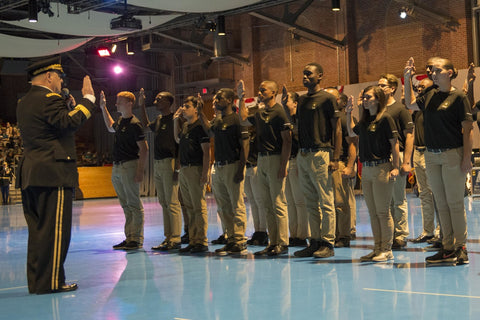 US Army soldiers being sworn in by an officer