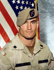 Army Photo of Pat Tillman In Uniform with Flag in the background.