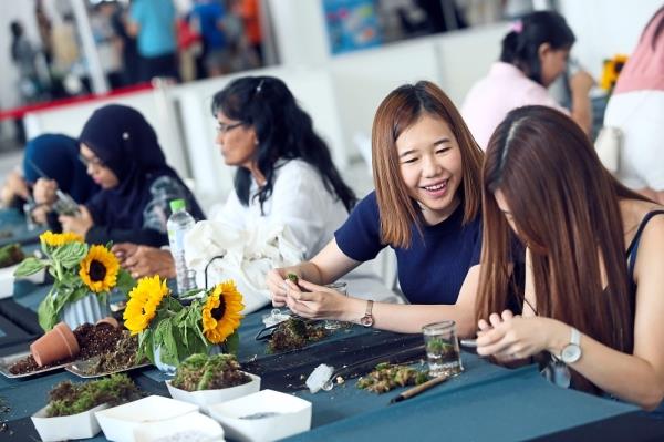 ladies making terrarium