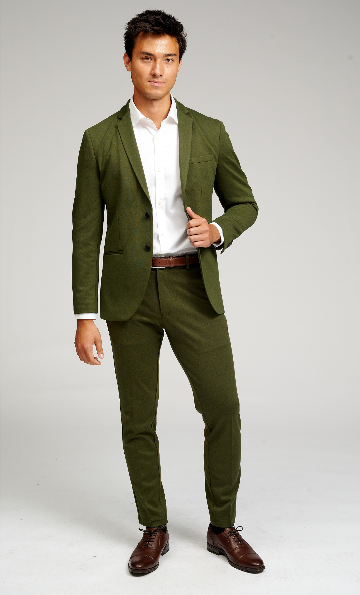 green shirt and suit