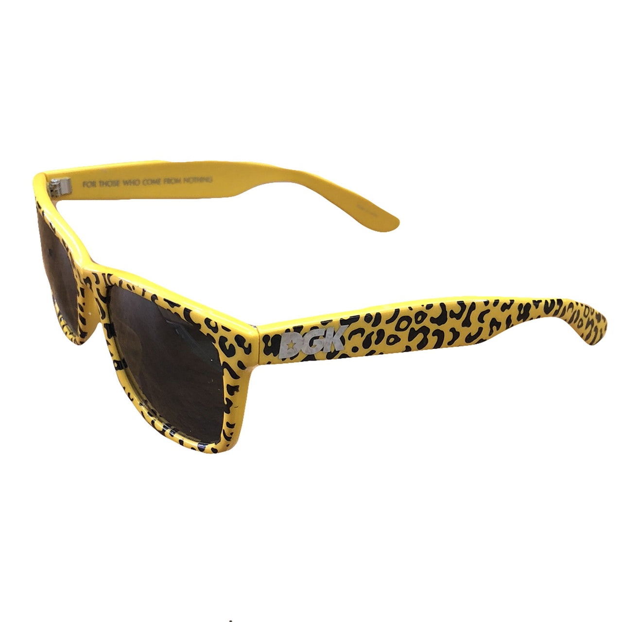 the dgk yellow cheetah print sunglasses have a yellow and black cheetah print frame