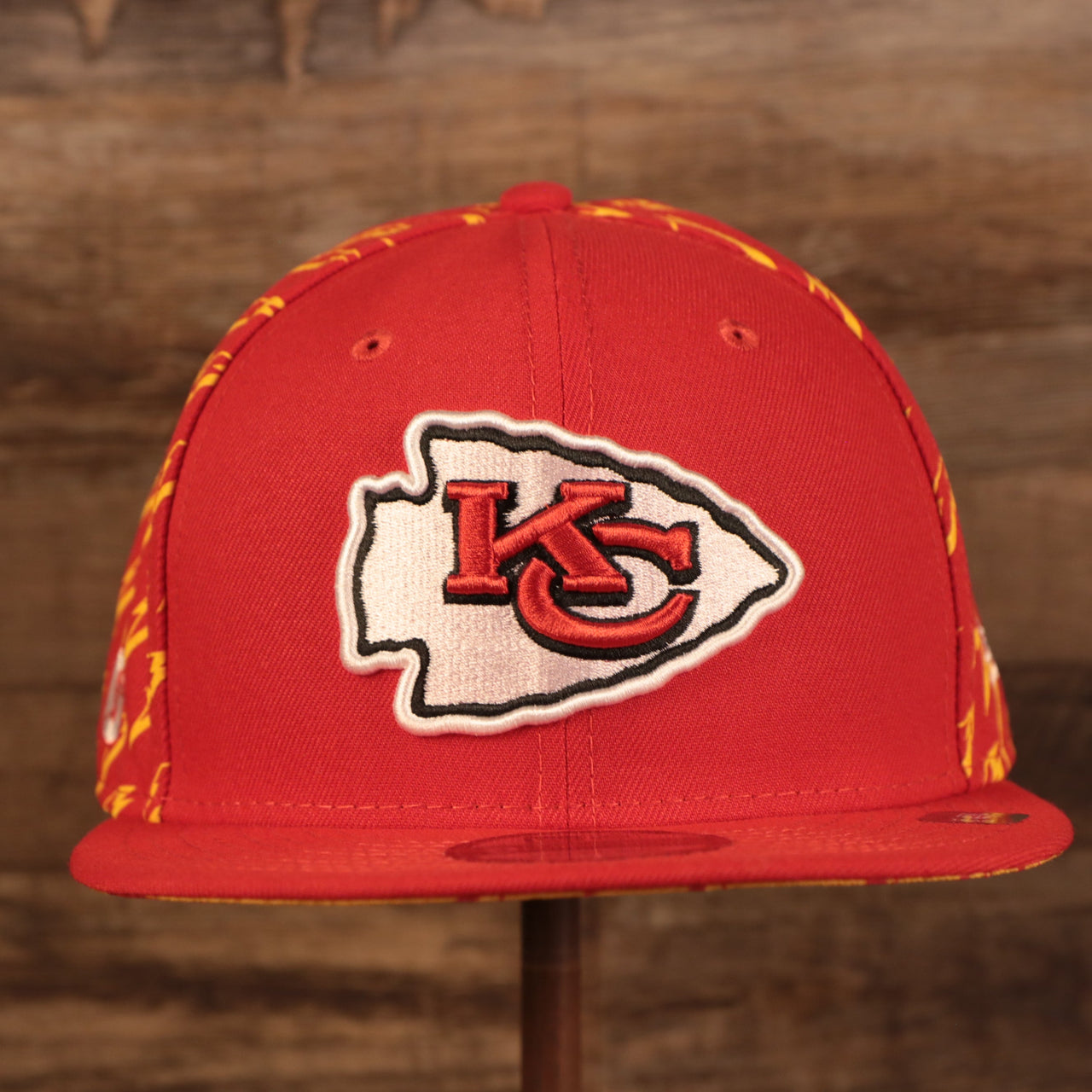 front of the Kansas City Chiefs x Gatorade Red 9Fifty Yellow Bottom Snapback