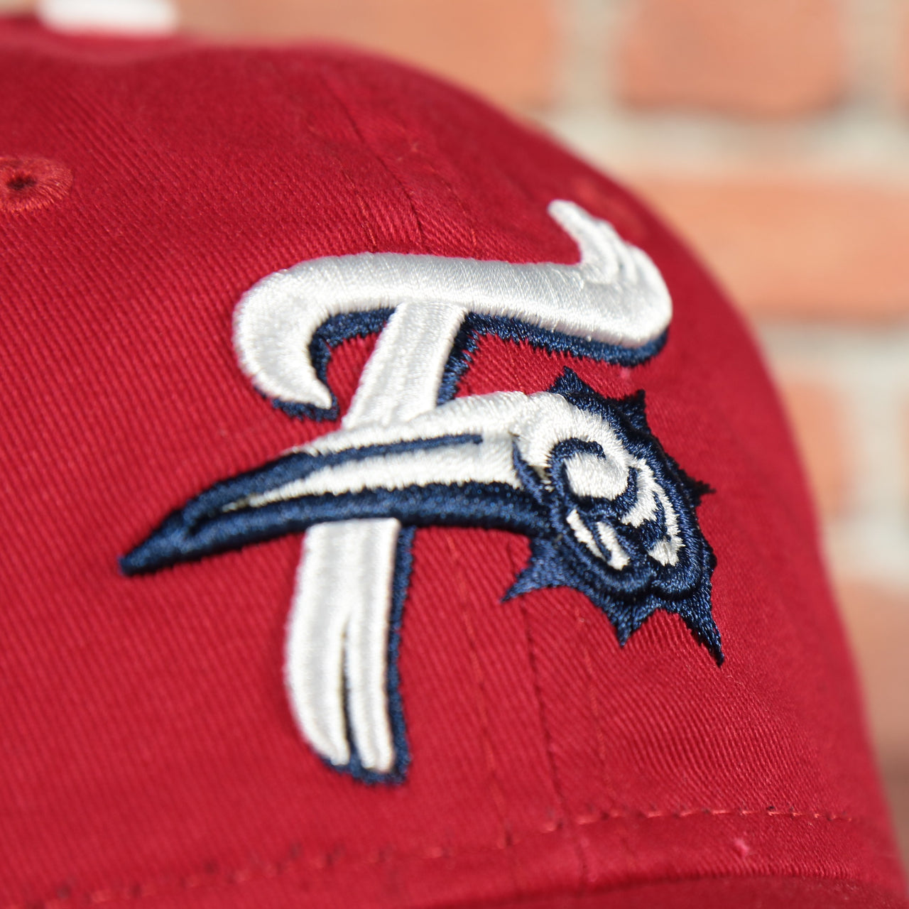 fightin phils logo on the Reading Fightin Phils MiLB Red bottom | Red 9Twenty Youth Dad Hat