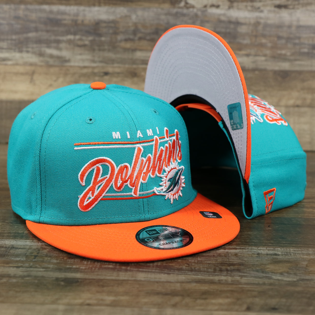 The Miami Dolphins Team Script Gray Bottom 9Fifty Snapback | Aqua and Orange Snap Cap