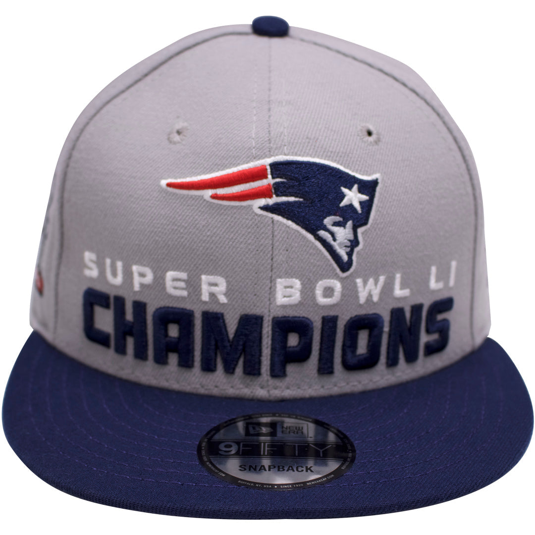 on the front of the New England Patriots, super bowl LI championship snapback hat is the New England Patriots logo and the words " Super Bowl LI CHAMPIONS"