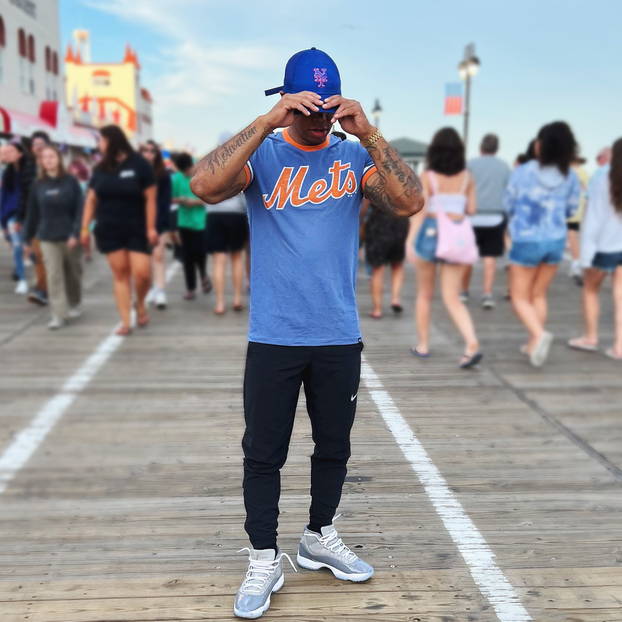 The New York Mets Wordmark Otis Ringer Tshirt With Orange And White Striped Sleeves | Cadet Blue T-Shirt