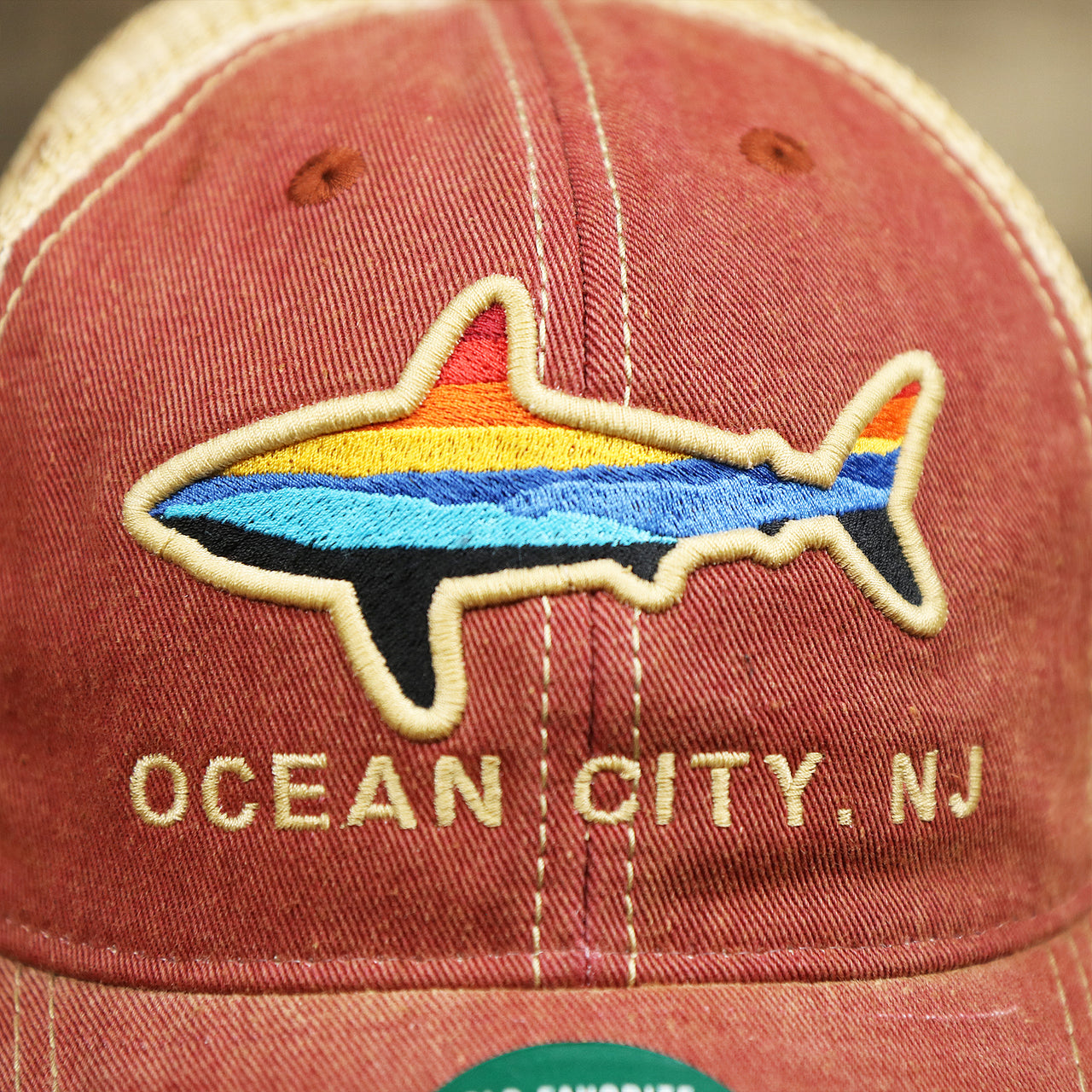 The front of the Ocean City Horizon Shark Vintage Mesh Back Worn Colorway Trucker Hat | Cardinal Trucker Hat