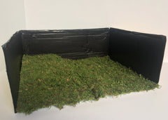 DIY Graveyard: Place moss in cardboard box