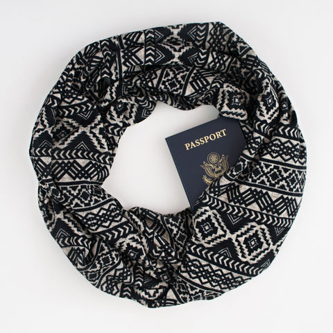 The Pueblo Speakeasy Travel Supply hidden-pocket scarf.