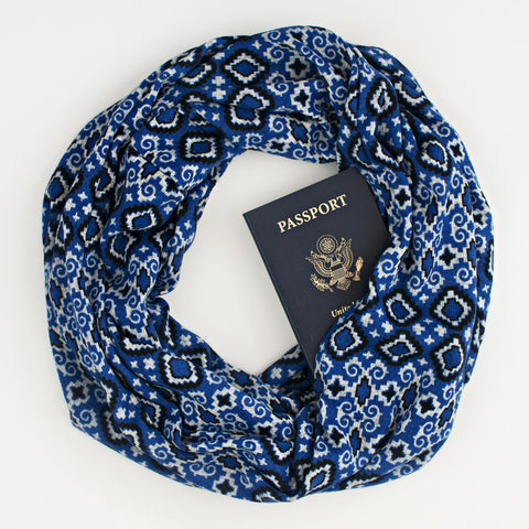 The Tuilieres (Blue) Speakeasy Travel Supply hidden-pocket scarf.