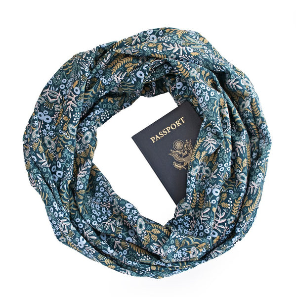 A floral print rayon secret pocket travel scarf.