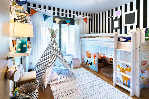 Use coordinating colors to make contrasting patterns blend together in kids' rooms.