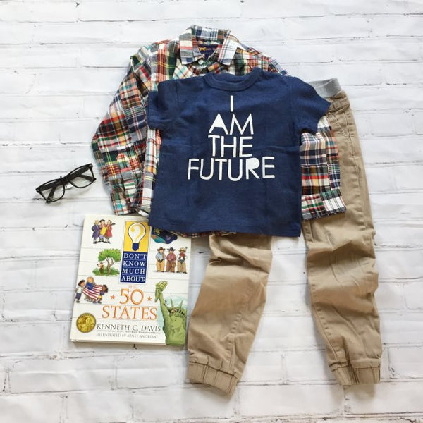 I am the Future t-shirt, plaid shirt, khaki pants, and kids nerd glasses