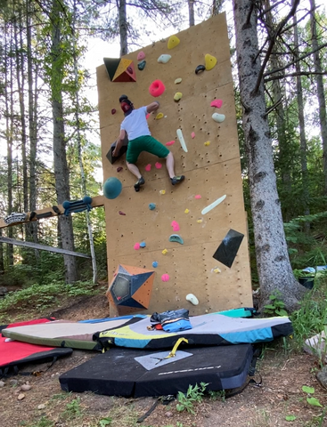 Home climbing wall. Home gym. Outdoor climbing wall.