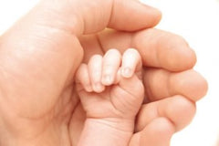 Mother And little baby hand. The Seaweed Bath Co. 