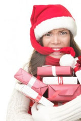 A woman Holds Christmas gift. The Seaweed Bath Co.