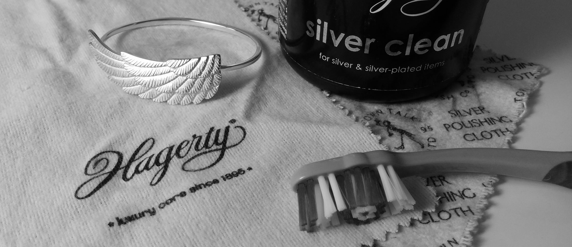silver bangle and cleaning products