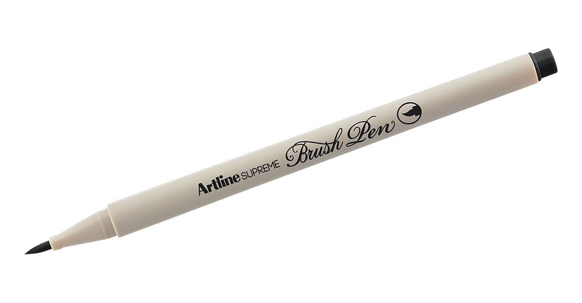 Handvest zij is tussen Artline SUPREME Brush Pen Sets