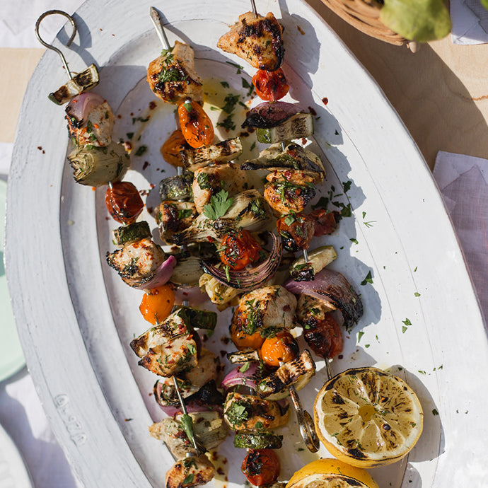 Yogurt Marinated Chicken and Artichoke Skewers with Herbed Dressing