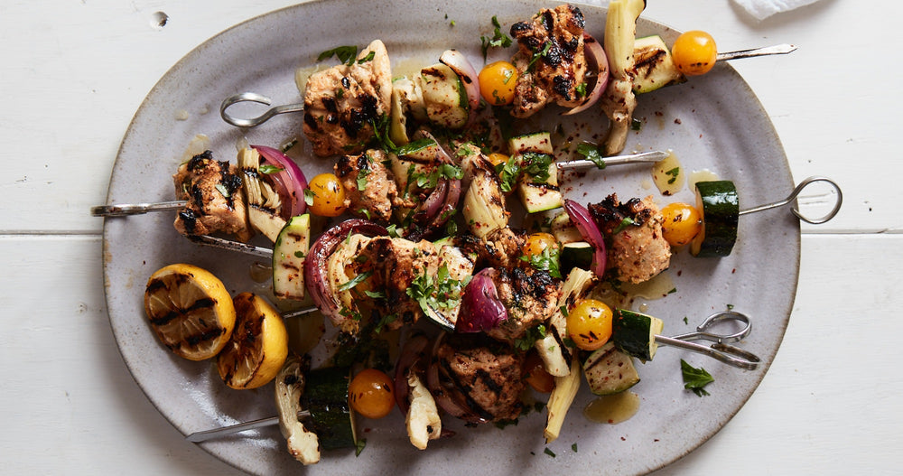 Yogurt-Marinated Chicken and Artichoke Skewers With Herbed Dressing