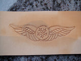 Hand carved wings with embossed stars