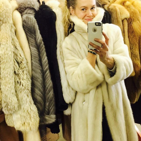 Sullivan surrounded by second hand furs in her Queen Street West shop