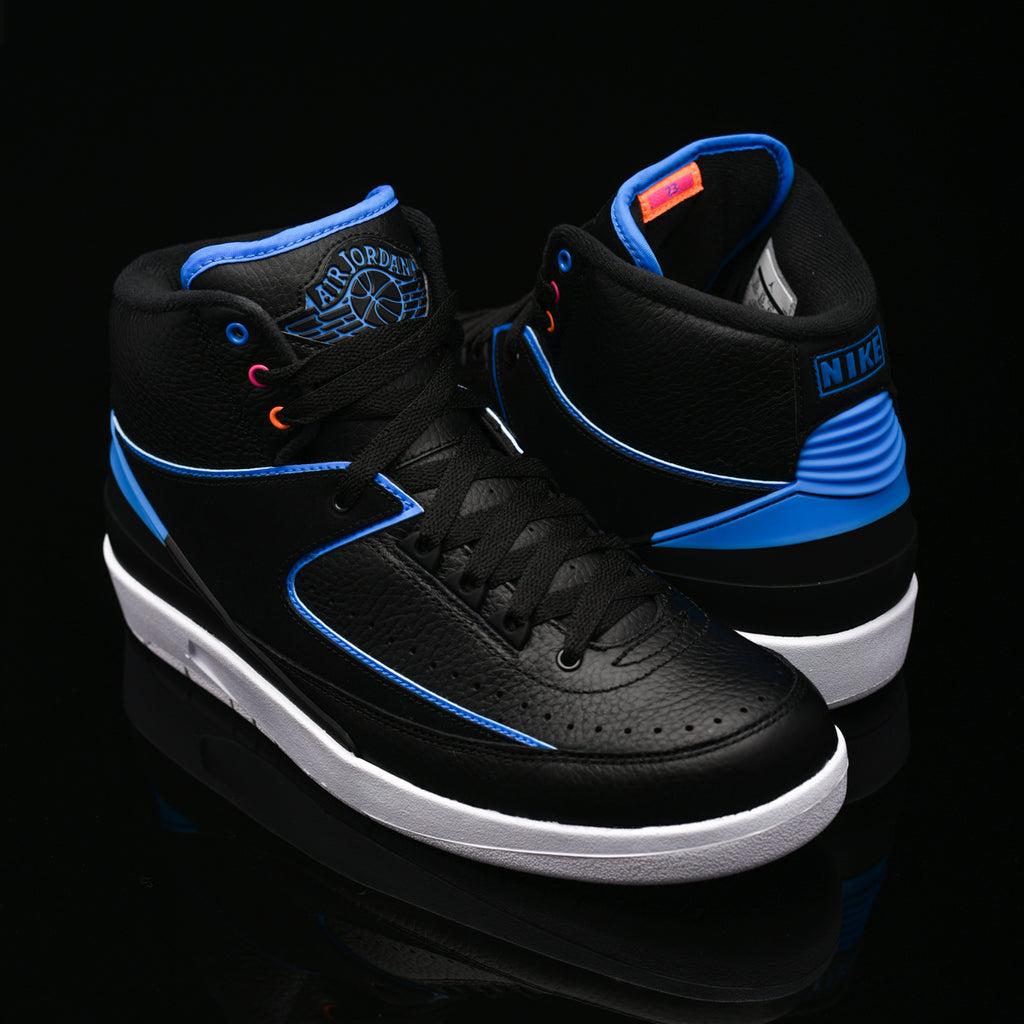 black and blue jordan 2s