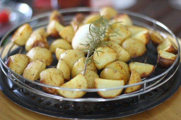 Potatoes roasted on the Cobb