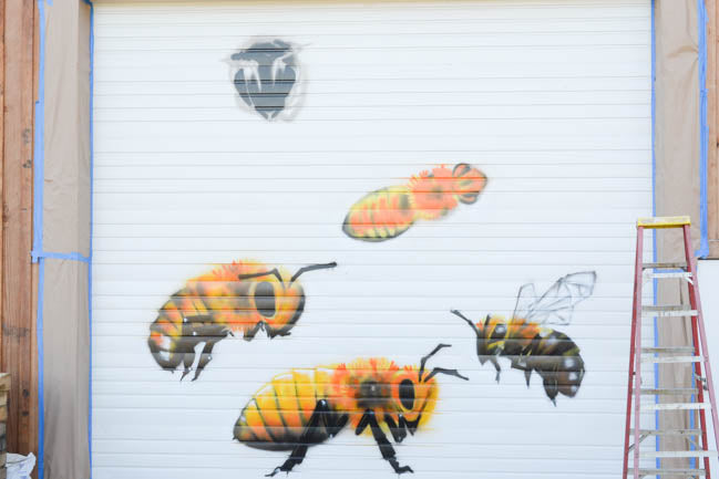 Honeybee Mural at Old Blue Raw Honey by artist Manny Arechiga