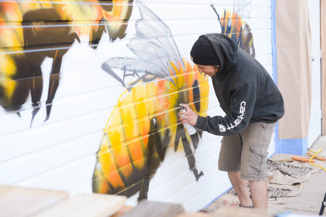 Honeybee Mural at Old Blue Raw Honey by artist Manny Arechiga