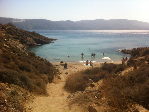 the sun on Agios Sostis beach, Myconos, Greece