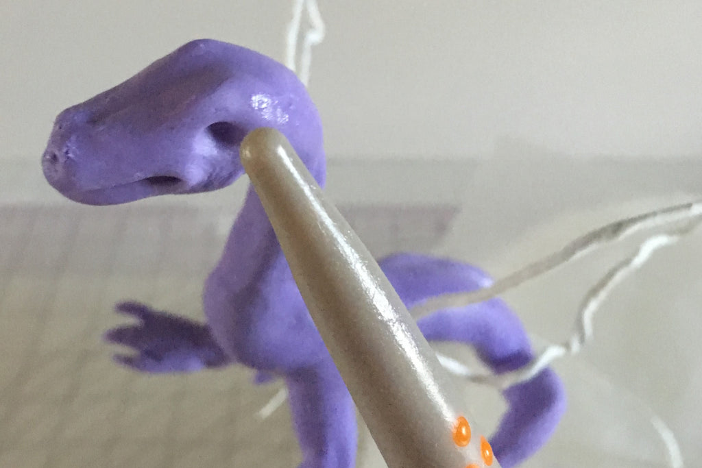 using Sugar Shapers to make a dragon cake topper