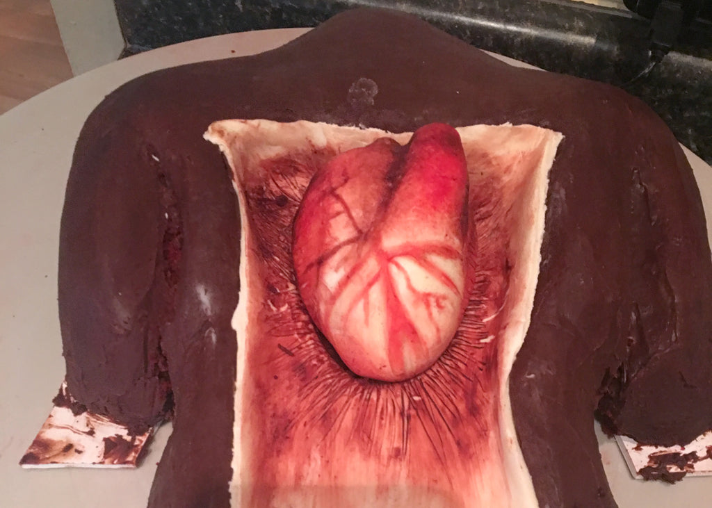 Chocolate heart in a torso cake by Guy Meets Cake