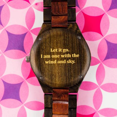 "Let It Go. I am one with the wind and sky." Frozen lyric engraving on a wood watch.