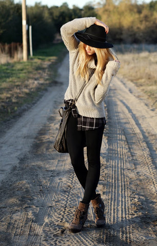 Hiking Boots Styled with a Flannel Shirt, Leggings, and a Warm Sweater