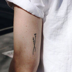 Flower tattoo subtle minimalist design trends 2016 inked body shoulder arm ink black white monochrome
