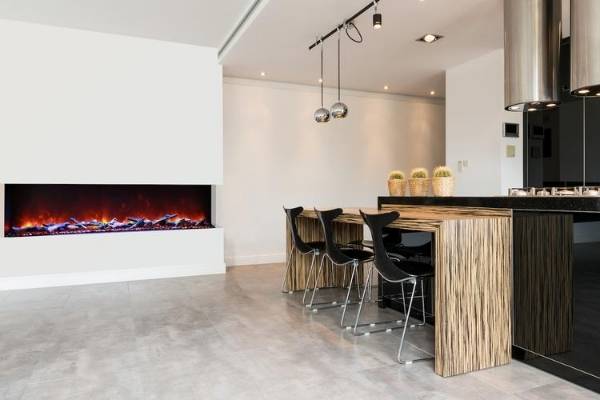 Long electric fireplace on a wall in a kitchen