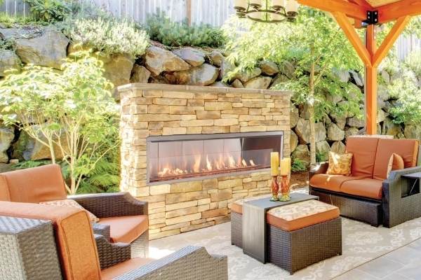 Outdoor gas fireplace in outdoor kitchen