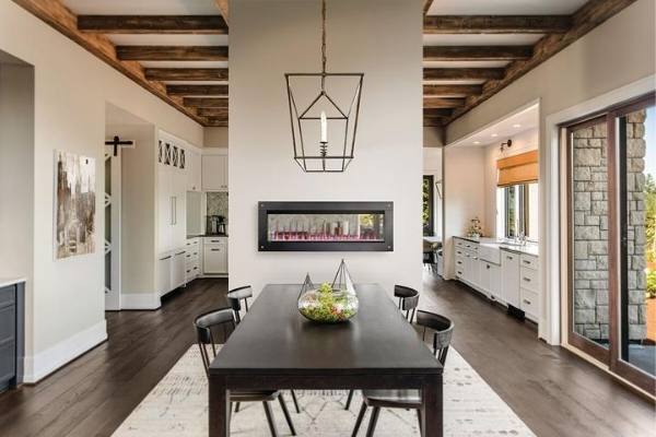 See through electric fireplace between kitchen and living room