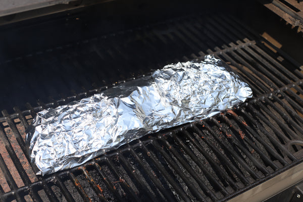 wrap ribs in foil and smoke for 2 hours