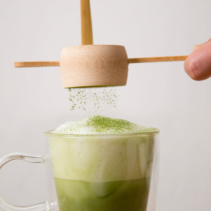 Matcha powder: sift and sprinkle Encha organic matcha on latte