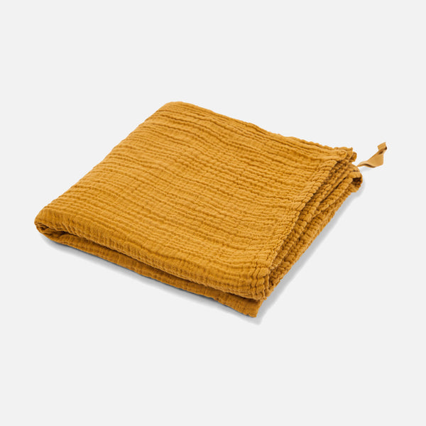 mustard muslin swaddle